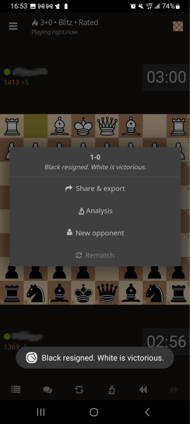 A screenshot from a chess app shows a small toast message with the text “Black resigned. White is victorious.”